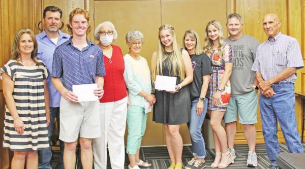 Pryce Parker and Sydney Smith are presented with scholarships by members of the Retired School Personnel, Glyndaline Hargest, Linda Zemler, and Neal Hinson. Also pictured are Pryce’s parents Robyn and Stephen Parker, and Sydney’s parents Dara and Chri Smith and Parker recipients