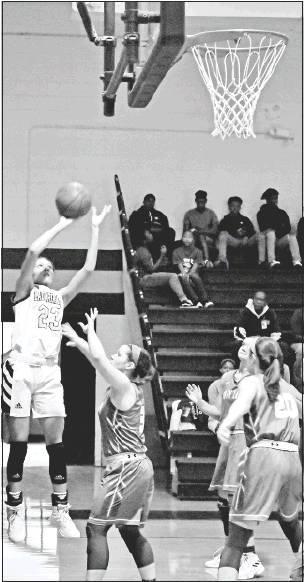 GAZETTE PHOTO / ELLIS KNOX Marlisha “Red” Swain shoots an amazing shot for two from the corner. Red scored seven points on the night but her rebounding along with Natalie Styles and Kianna Blackwell kept the Lady Panthers off balance. Tyler Green was Article Image Alt Text