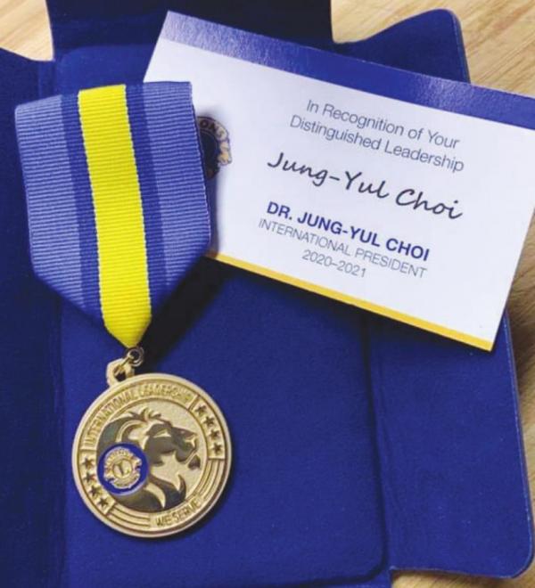 Thompson receives awards for service