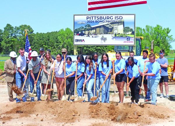 PISD students broke ground and shoveled dirt as part of the groundbreaking ceremony. GAZETTE PHOTO / MOLLIE MCCLANAHAN PISD students broke ground and shoveled dirt as part of the groundbreaking ceremony. GAZETTE PHOTO / MOLLIE MCCLANAHAN