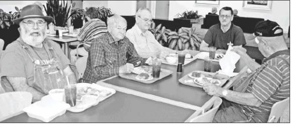 GAZETTE PHOTO / LYNDA STRINGER Camp County seniors enjoy a free lunch at UT Health Pittsburg’s café as part of a program through the Area Agency on Aging. Pictured, from left, is John Wade, Richard Johnson, Gerald Morse, Tony P Article Image Alt Text