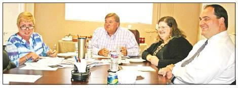 Members of the Chamber’s Independence Day Blast Committee make final plans with Broach Park Director Mike Reynolds and Community Development Director/Main Street Manager Niecy Baum for the July 4 event. Pictured, from left, is Chamber Executive Director Christine Jackson, Board President James Wallace, and Committee Members Emily Shearin and Jas Wallace. Article Image Alt Text