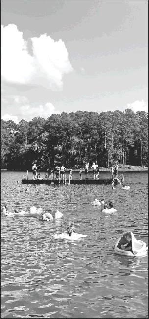 Visitors enjoy relaxing and kayaking the lake at Daingerfield State Park. Article Image Alt Text