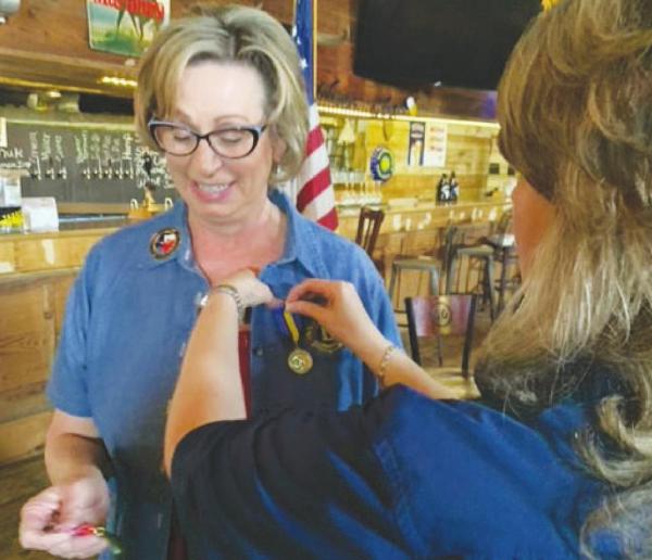 Thompson receives awards for service
