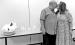 Lion Treasurer Charlie Wilson kisses fiancee Laura Rowley at surprise gathering