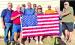 Rotarian Flag Project Committee preparing for distribution.
