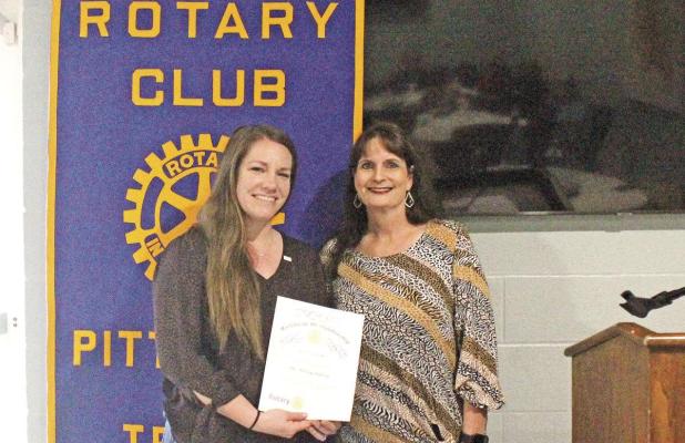 Rotarians welcome new member