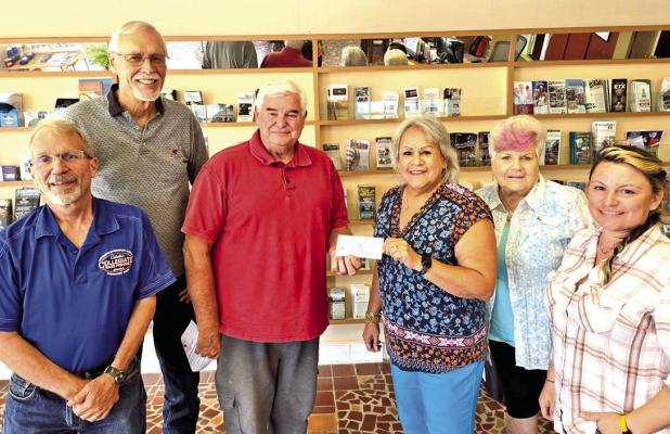 Mark Levy, Perry Wilson, James Wallace, Connie Bradshaw, Chamber Executive Director holding the check, Jean Frankovitch and Jenni Currey Courtesy photo