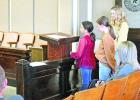 4-H members speak to the Camp County Commissioners. GAZETTE PHOTOS / MOLLIE MCCLANAHAN 4-H presents to Camp County Commissioners