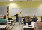 Lesa Tyler shares her book with Pittsburg Rotarians GAZETTE PHOTOS / MOLLIE MCCLANAHAN Rotary hears from author, Lesa Tyler
