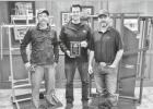 SWEPCO’s George LePoris (center) presents a plaque to Priefert Manufacturing’s Eddie Priefert and Nate PRiefert for the company’s commitment to energy efficient measures. COURTESY PHOTO Priefert Manufacturing receives SWEPCO Evergreen Award