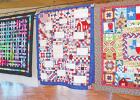 Rainbows (Colleen Turner), American Sampler Quilt (Bedie Cook, Stephanie Dildine, Karen Cook, Betty Cook, Gertrude Rees, Charlene Shaw, Margaret Shumate, Audrey Shumate), and Quilt Across Texas (Joy Lindsley) Handmade quilts offer beauty and warmth