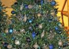 The carol “Silent Night” is represented by a glistening blue and silver tree. Sparkling exhibit showcases past and future Christmas prophecies