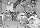 GAZETTE PHOTOS / LYNDA STRINGER The Pittsburg community turned out in large numbers Monday for the soft opening of the new downtown restaurant Flying Cow Burger & Wing Co. The business at 120 Jefferson Street is owned by Brandon and Carmen Swafford, w Article Image Alt Text