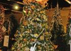 “There’s a Song in the Air” really does have musical notes suspended above the tree. Sparkling exhibit showcases past and future Christmas prophecies