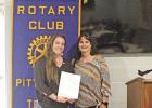 Rotarians welcome new member