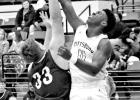 Pirate cager Zay Doddy (11) puts up a shot during a recent home game.