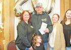 Left to right: Curtis’ wife Julee Cunningham Young, granddaughter Khonlee, Curtis Young, and three daughters Mylee, Baylee, and Kaylee. Twenty years of commitment