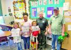 Second grade students awarded by Masons for reading challenge