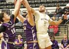Pirate Nick Styles (2) tries to haul in a rebound versus Mount Vernon last week. GAZETTE PHOTOS / MICHAEL S. MCCRACKEN