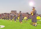 Graduating seniors show support for their classmates as they take the stage to receive their diplomas. GAZETTE PHOTO / DI DUNCAN Article Image Alt Text
