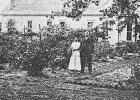 Mr. and Mrs. Lon Morris in their rose garden. Mr. Morris was a Pittsburg banker and Lon Morris College in Jacksonville, a Methodist institution, was named for him. The Morris home was located where the Pittsburg Service Station stood in later years, adjac The Morris’ Rose Garden
