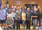 Rotarians recognized as Paul Harris Fellows. In front: Woody Ray. Front row L to R: Sabin Warrick, Karen Ray, Judy Hamilton, Terry Waldrep, Kathy Rape, Charlie Wilson, Kay Green, and Rachel Miner. Back row L to R: Bill Dixon, Chuck Hamilton, Mike Reynolds