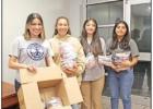 Left to right: Interact Club members Ingrid Baizabal, Delilah Medina, Gabby Clifton, and Jhona Garcia. They assisted the distribution of headsets among the school children. Rotary donates headsets to third graders