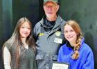 Delilah Medina and Keira Slone were presented with a certificate of appreciation by Commander Frank Harrison of the American Legion Post 422 for their participation in leadership of the PISD band in the 2022 Veterans Day program. The band played several p PISD students
