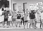 Protestors marched from Quitman Street to HWY 271 to raise awareness of the police brutality issue. GAZETTE PHOTO / DI DUNCAN No justice, no peace