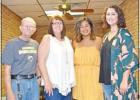 GAZETTE PHOTO / DONNIE BLUNT Pittsburg Gazette staff members pose for a farewell photo with Keilani Cheek, who left the newspaper Aug. 1 to work for First Kids Academy. Pictured, from left, is Ellis Knox, Lynda Stringer, Cheek, and Chelsey Elrod. Article Image Alt Text