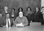 Morris County Collaborative members were on hand as local lawyer Nelson Roach of Roach Law Firm signed paperwork giving the group a permanent home. Present at the signing were (seated, left to right) Greg Frazier, President, Morris County Collaborative (M Collaborative receives permanent home in Morris County