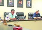 Brayden Hooper (right) gives a presentation regarding a first responder drone to the city council. GAZETTE PHOTO / MOLLIE MCCLANAHAN