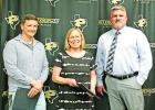 High School Principal Rustin Ramsey (right) presented Pirate Gold Awards to Laura Nowell (center), Jesse Morrow (left), Brenda Gonzalez (not pictured) and Ginger Holt (not pictured) for their hard work and efforts at the school. GAZETTE PHOTOS / ELIZABETH Parker retiring from school board