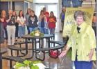 GAZETTE PHOTO / ELLIS KNOX The food concourse in the new Jack Arnwine gymnasium was named for Judy Pollan, the tables in the photo were donated by the staff and teachers of PISD and several businesses. Pictured extreme right is Pollan admiring the tables Article Image Alt Text