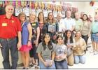 Pittsburg Rotary Club and Interact Members at the Elementary School GAZETTE PHOTO / ELIZABETH LANNING Rotary donates headsets to third graders