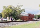 Many individuals place pennies along the train tracks GAZETTE PHOTOS / MOLLIE MCCLANAHAN Pittsburg welcomes steam locomotive