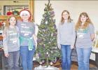 GAZETTE PHOTO / ELLIS KNOX During lunch time at the Pittsburg Nursing Home on Friday, Dec. 6, four young ladies of the Pittsburg 4H Club visited the facility. The sisters, Sadie Wheeler, Gracie Wheeler, and Addi Wheeler, passed out Christmas Cards as Josi 4H visit Pittsburg Nursing Home