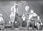 Clown 1 and Clown 2 sing and play music trying to create a festive atmosphere Clown 1 and Clown 2 sing and play music trying to create a festive atmosphere