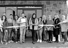 AT&T has opened a new store in Pittsburg on Highway 271 South right next door to Golden Chick, and held their Grand Opening and Ribbon Cutting on February 22. Noryleinn Tosado, center of picture and manager of this location, has enjoyed meeting the lo AT&T Grand Opening
