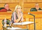 GAZETTE PHOTO / LYNDA STRINGER Mandy Hobbs considers a question during her testimony at an open hearing before the Pittsburg ISD School Board Monday night. The marathon session lasted nearly five hours in a boardroom packed with people eager to hear the f Article Image Alt Text