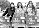 Selene Heredia, Tatiana Narvaez and Shelly Martinez of the Child Advocacy Center put signs out around the Camp County Courthouse about April being Child Abuse Awareness Month. Selene Heredia, Tatiana Narvaez and Shelly Martinez of the Child Advocacy Center put signs out around the Camp County Courthouse about April being Child Abuse Awareness Month.