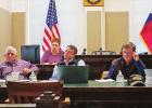 GAZETTE PHOTO / ELIZABETH LANNING Two contracts are approved during regular meeting of Commissioners Court. Contract for jail expansion approved