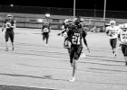 Lachristian Johnson breaks away for a touchdown during a recent game. The Pittsburg Pirates will celebrate Senior Night Friday prior to their regular season finale against Gilmer. GAZETTE PHOTO / QUINTEN BOYD Second half Leopard run pushes L-E past Pirates