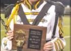 Pitt Band Drum Major senior Skyler Brown holds the fourth-place plaque the band earned in competition at the Northeast Texas Marching Festival in Mount Pleasant, Saturday, Oct. 12. Skyler received a first with her performance as drum major. GAZETTE PHOTOS / ELLIS KNOX
