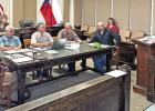 Jill Penn (right) invites commissioners to THLN event. Jill Penn (right) invites commissioners to THLN event.