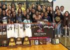 Pittsburg’s Randieunna Jeffery has signed a letter-of-intent to compete in track at Colby Community College in Colby, Kansas. She is pictured here with family, friends and teammates during her recent signing at Pittsburg High School. COURTESY PHOTO
