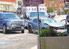 The accident Monday afternoon forced both vehicles to be towed from the scene and one driver was taken to the hospital in an ambulance. GAZETTE PHOTO / DI DUNCAN Crash occurs at downtown intersection