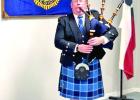 Piper Dr Bryan Robinson ended the memorial playing “Amazing Grace”