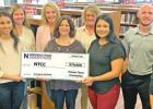 Pictured receiving the first $70,000 installment of the Texas Emergency Aid Roadmap Grant on behalf of NTCC is (from left) Erika Garza, Susy Perez, Billi Jo Thomas, Kim Irvin, Nita May, Anna Ingram, Jessica Dorantes, Jeff Chambers and Mason May. COURTESY NTCC receives Greater Texas Foundation grant